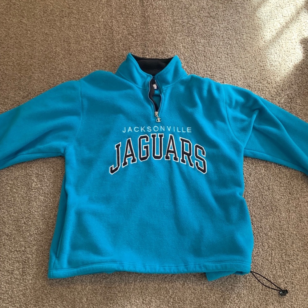 Champion Jacksonville Jaguars Fleece throw over.